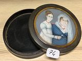 a small box with a picture of two people on it
