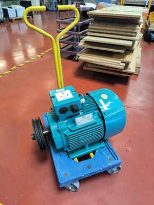 a machine that is sitting on the floor in a warehouse