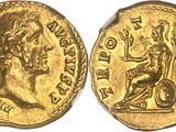a gold coin with an image of a man on a horse