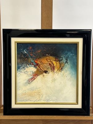 a picture of a painting of a crab on a shelf