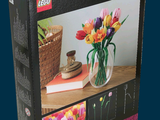 a box with a picture of a vase of flowers on it