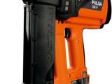 an orange and black staple stapler on a white background