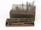 a box with tools in it on a white surface