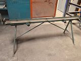 an image of a bench made out of a piece of wood