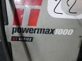 a close up of a powermax1000 gas pump with a sticker on it