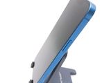 a close up of a cell phone on a stand
