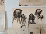 many drawings on the wall of this room
