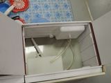 an overhead view of a bathroom with a toilet and a sink