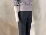 an image of a mannequin wearing a suit and tie