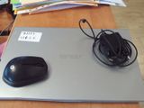 a computer mouse and a mouse pad on a desk