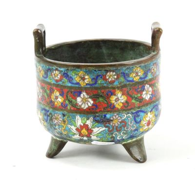 an image of a colorful flowered pot on a stand