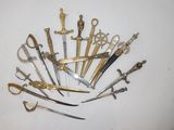 a lot of different types of scissors on the table