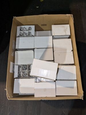 a box full of white boxes sitting on a table
