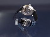 a watch that is sitting on top of a glass table