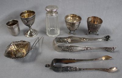 a lot of silver items that are on a table