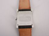 an image of a close up of a wrist watch on a white surface
