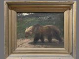 a painting of a bear in a frame on the wall