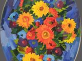 painting of a bouquet of flowers on a blue plate on a table