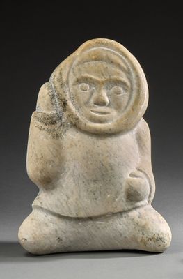 an image of a stone statue of a man with a hat on his head