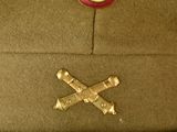 a close up of a military hat with a cross on it