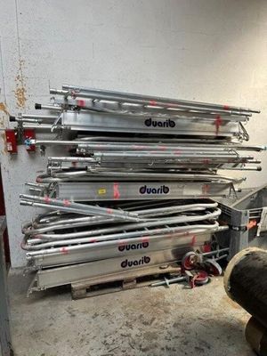 a lot of metal racks that are stacked on top of each other