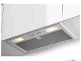a picture of a kitchen hood with lights on it