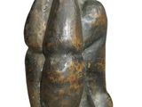 statue of a man and a woman sitting on their backs