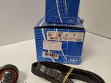 a close up of a box of belt and a pair of rollers