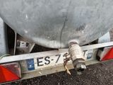 a close up of a fuel tank on the back of a truck