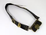 a black and gold belt with a metal buckle on it