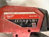 the milwaukee milwaukee m18 fix tool is sitting on the table