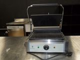 an image of a grill on a table in a kitchen