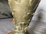 a vase that is sitting on top of a table