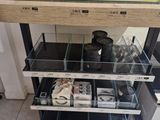 a display case with various items on it in a store