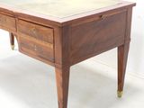 an image of a wooden desk with a glass top