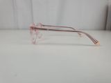 a close up of a pair of glasses on a table