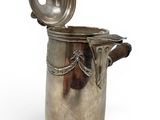 a silver cup with a lid on a white background