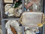 a metal cart with a lot of items inside of it