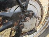 a close up view of a bike ' s front wheel