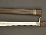 a knife and a knife holder on a table