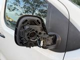 a close up of a car ' s side mirror with the door handle open
