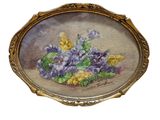 tableau représentant un bouquet de fleurs dans un cadre doré sur fond blanc