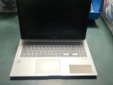 a laptop that is sitting on a table in a room