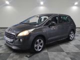 a picture of a grey car parked in a garage