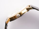 an image of a close up of a watch on a white surface
