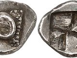 a close up of a coin with an image of a man on it