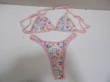 an image of a bikini top and panties on a white surface
