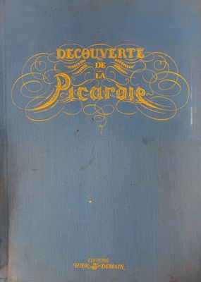 la couverture d'un livre bleu orné d'une inscription dorée