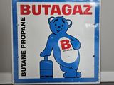 un panneau bleu et blanc sur lequel figure l'image d'un ours