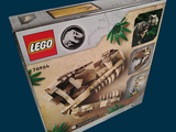 a box that has a lego army tank inside of it